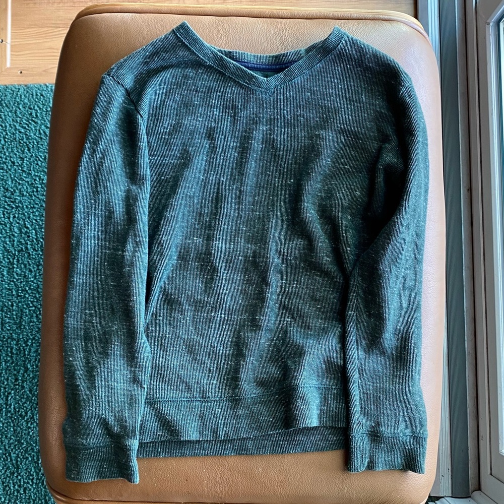 V necked sweater. Olive green. Size 10-12